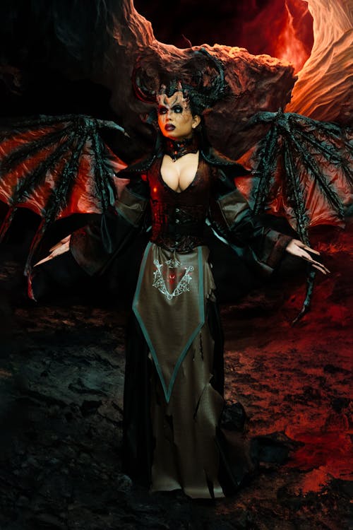 Woman Wearing a Devil Costume with Horns 