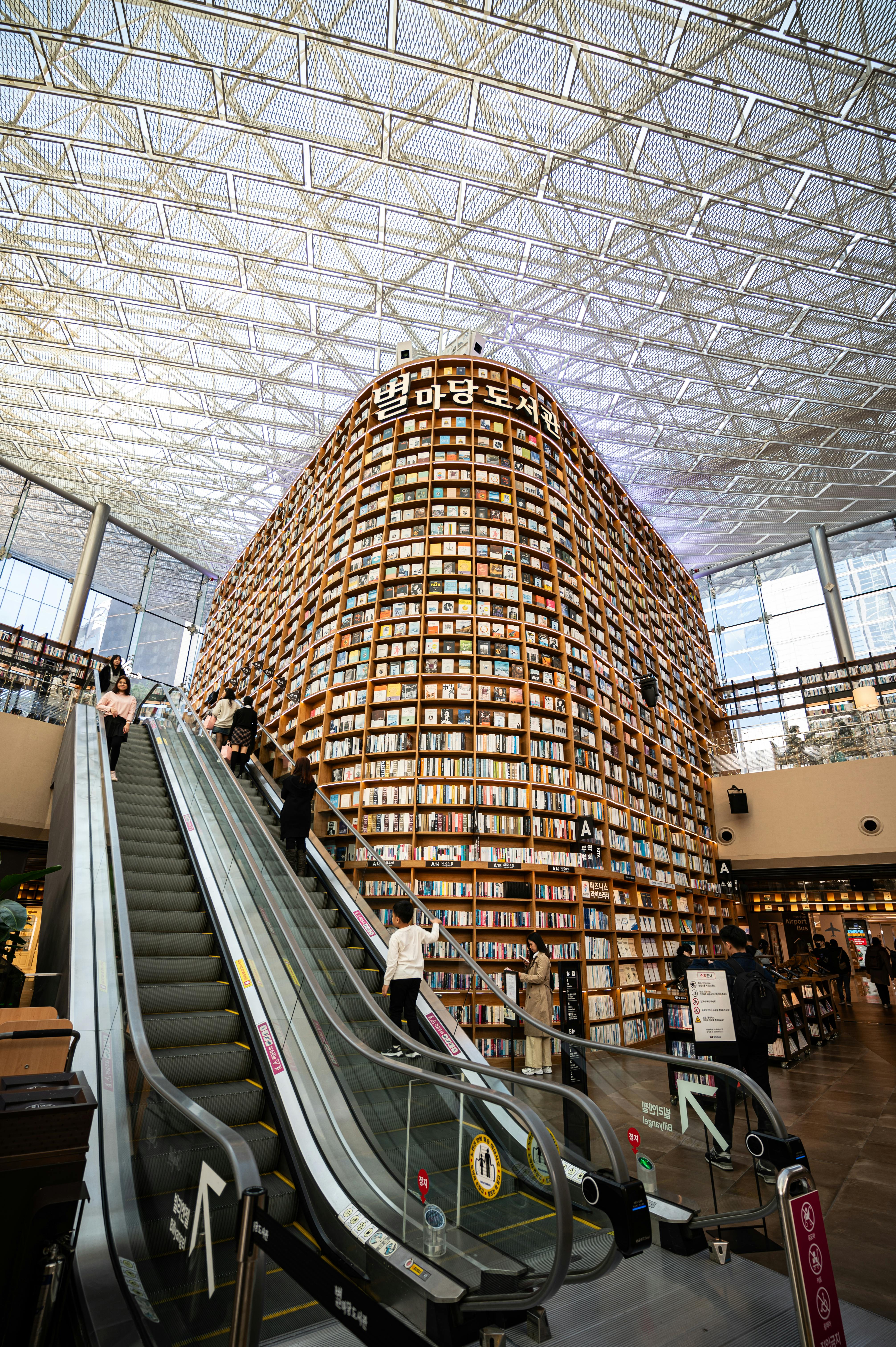 Explore the stunning Starfield Library with its towering bookshelves in Seoul, South Korea.