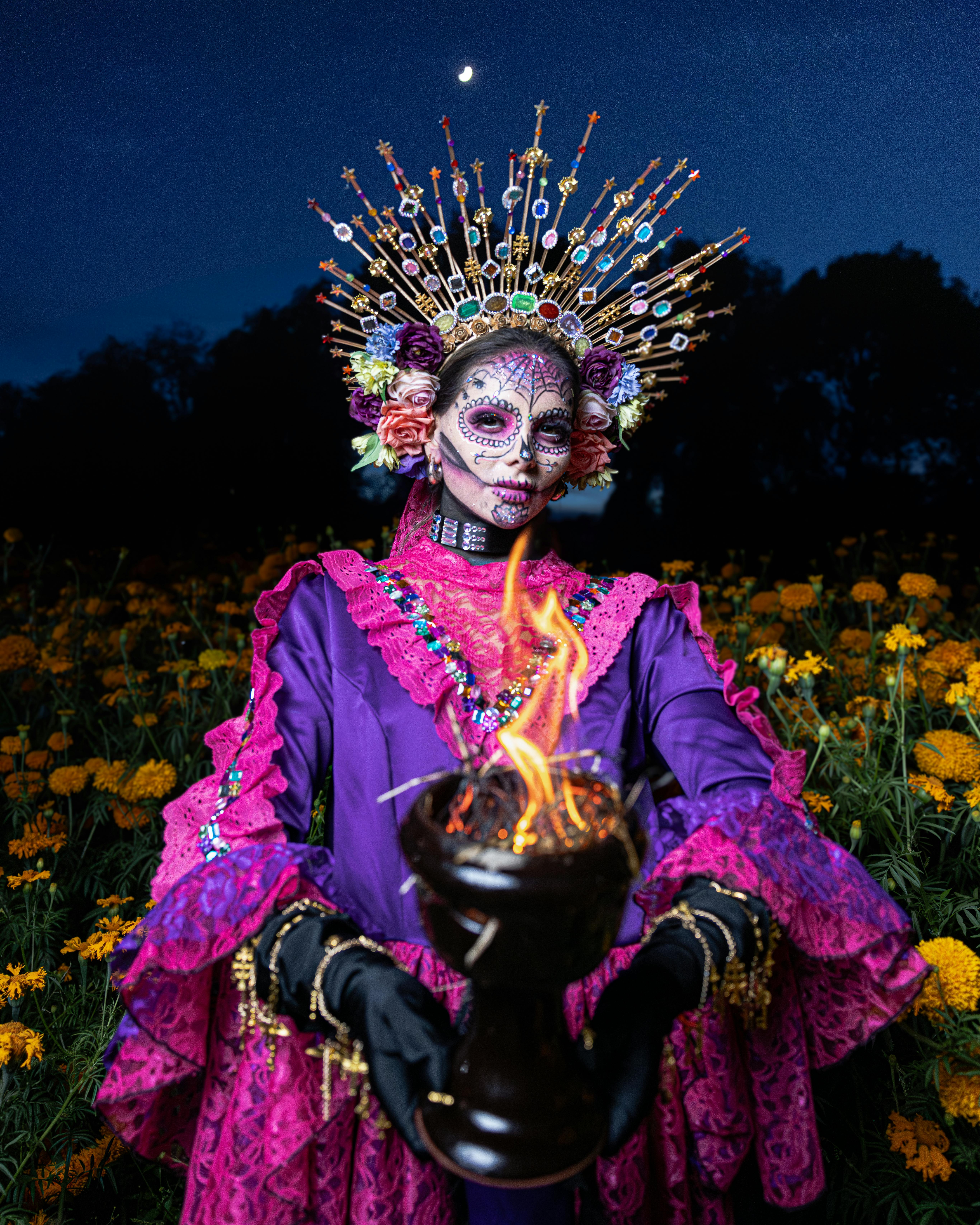 woman in a costume and makeup for the day of the dead celebrations in mexico