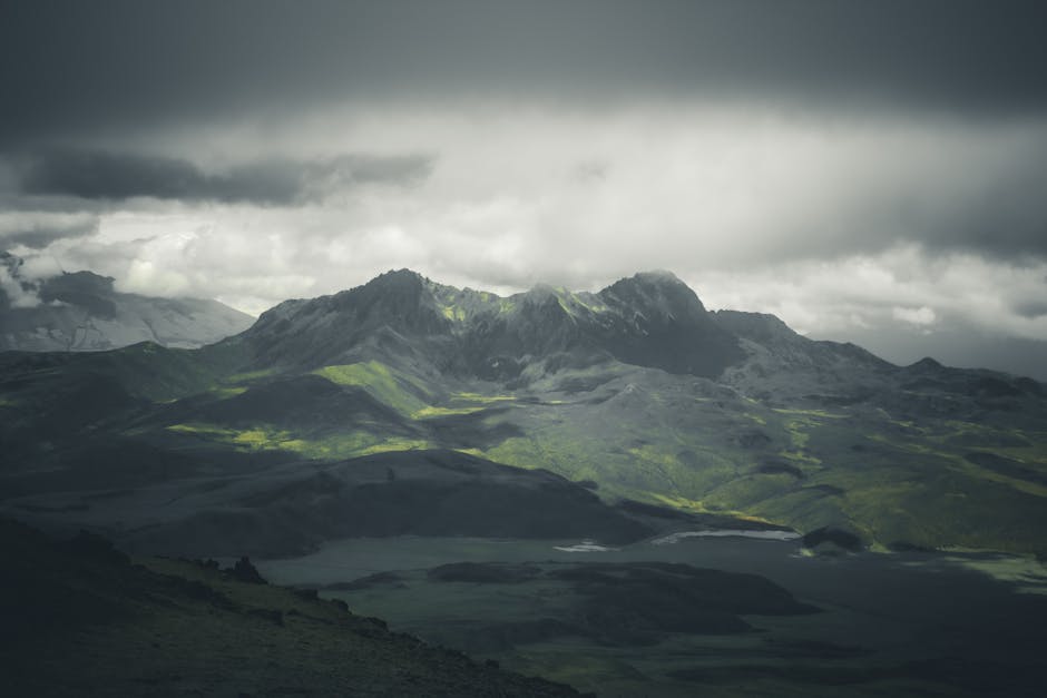 serene mountain peak shrouded in mist with soft warm lighting - Why high achievers ignore mental health serene mountain peak shrouded in mist with soft warm lighting - Why high achievers ignore mental health
