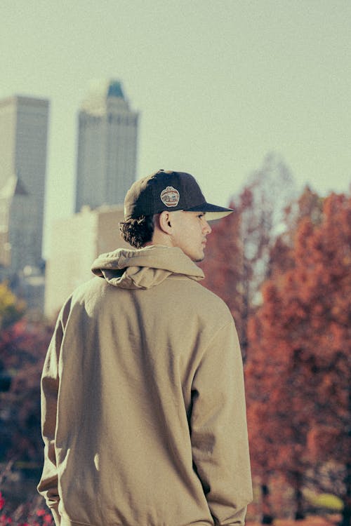 Young Model in Hoodie and Cap