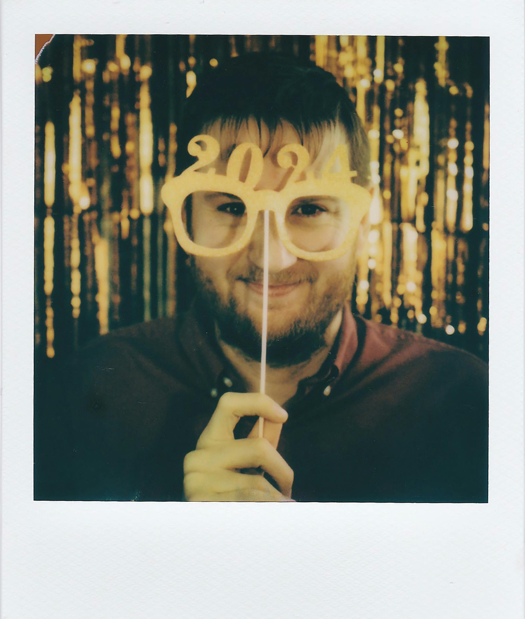 smiling man celebrating new years eve