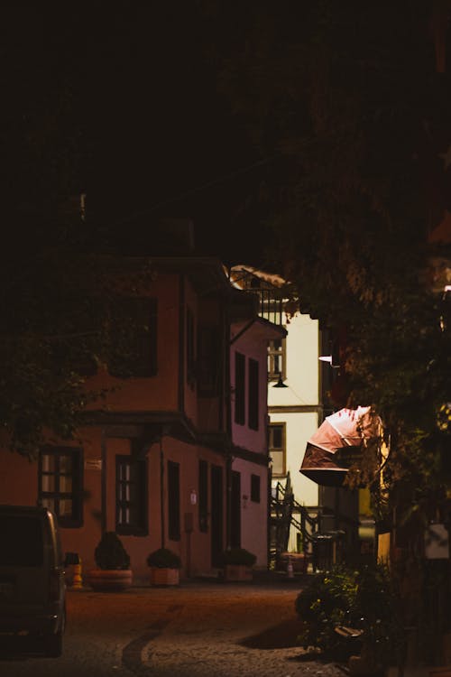 Narrow, Cobblestone Street in Town in Darkness