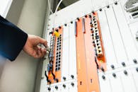 Engineer fixing core swith in data center room