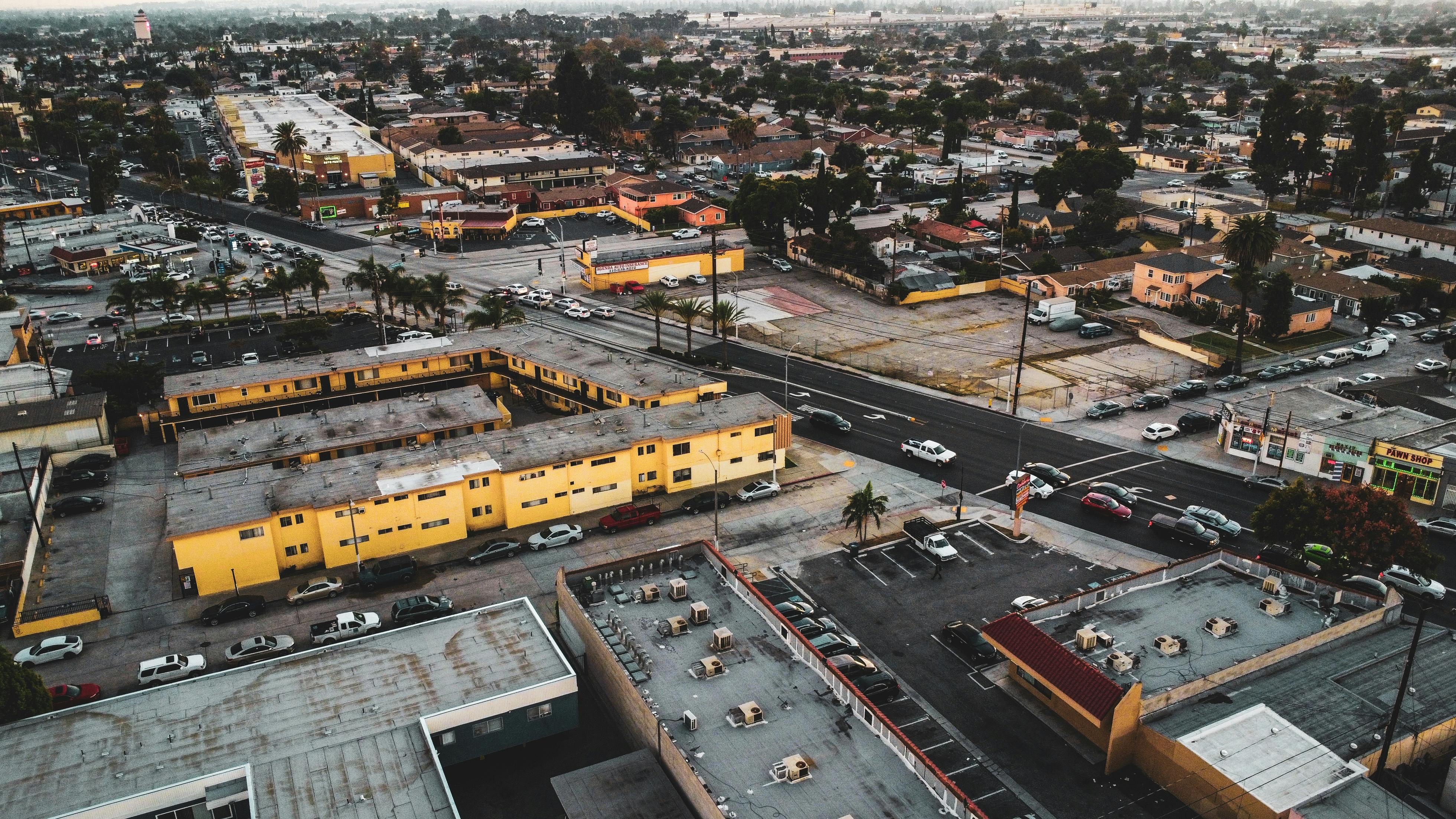 Aerial view of Los Angeles showcasing city streets, buildings, and urban layout.