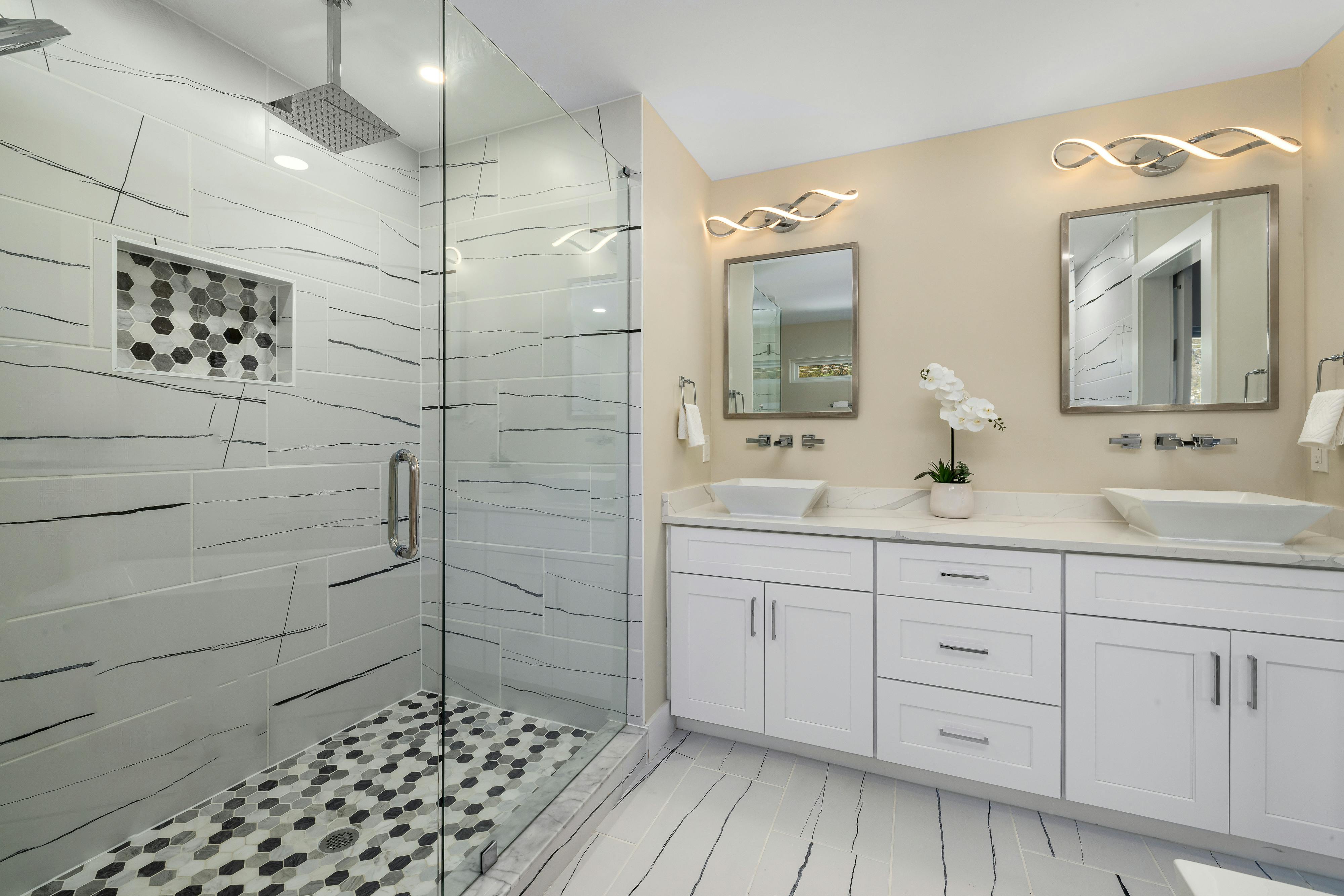 stylish mid-range bathroom with new vanity and walk-in shower - Bathroom remodel cost Florida