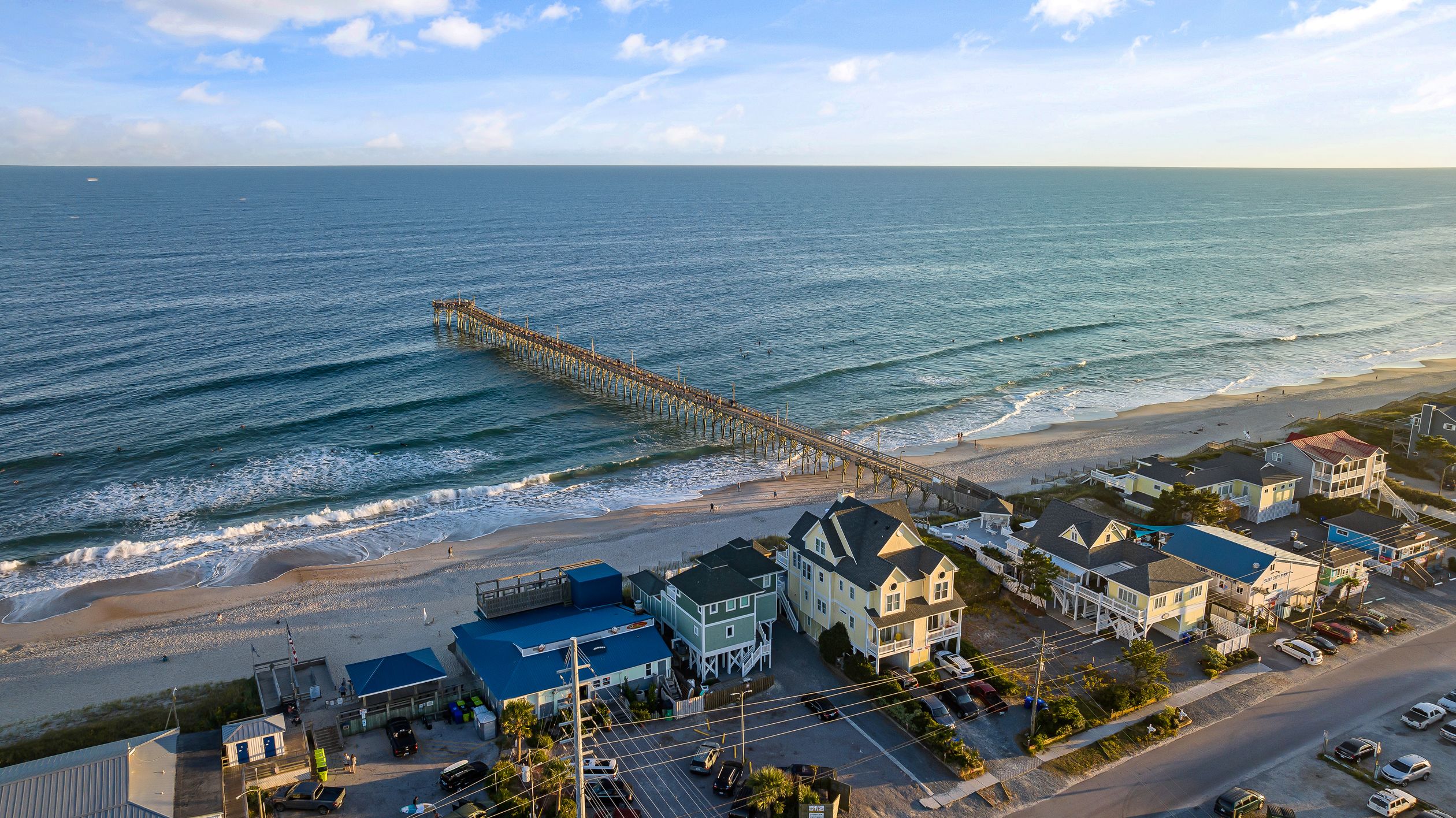 Birds Eye View of a Beach and Pier · Free Stock Photo