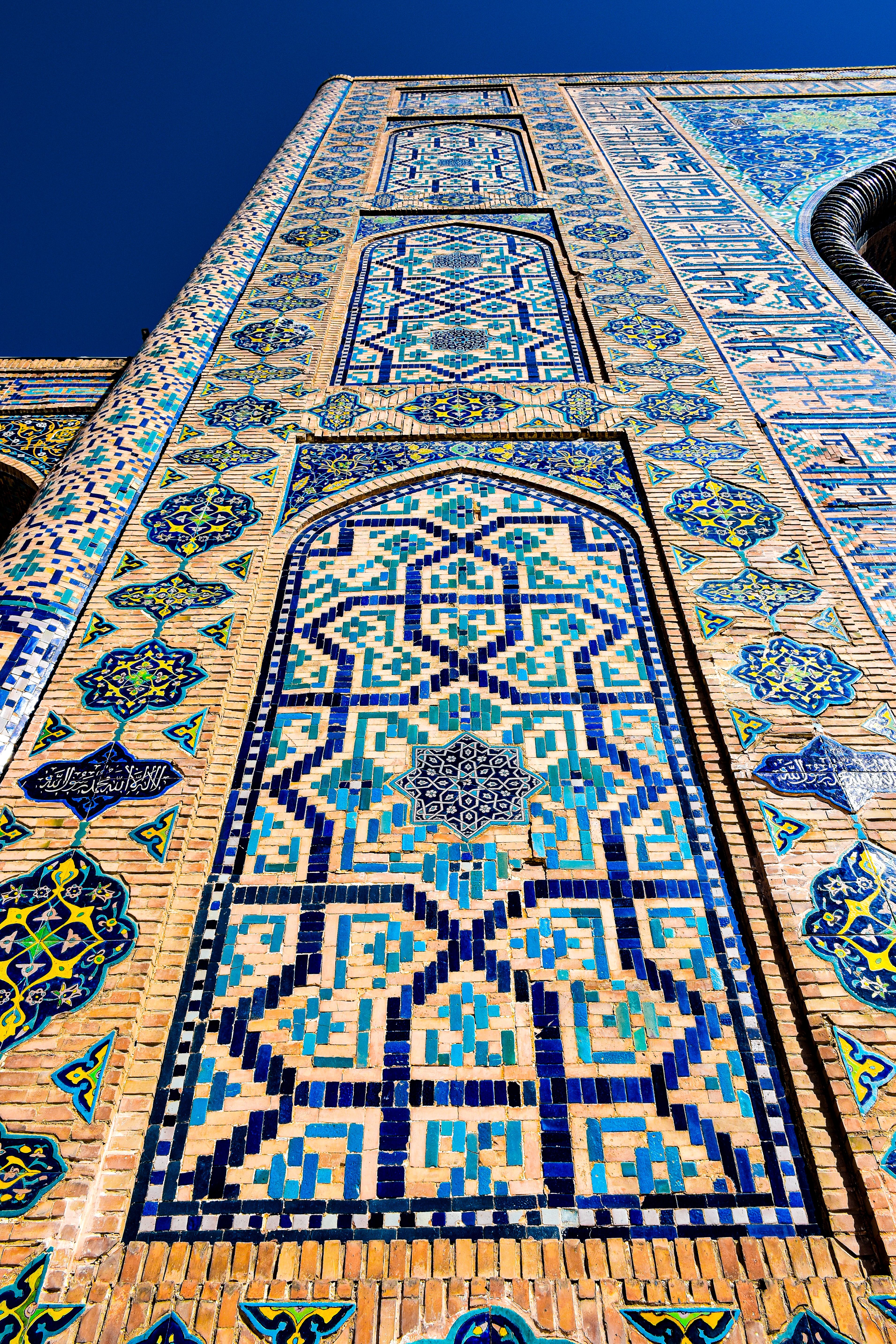 The blue sky and blue tiles of a mosque · Free Stock Photo