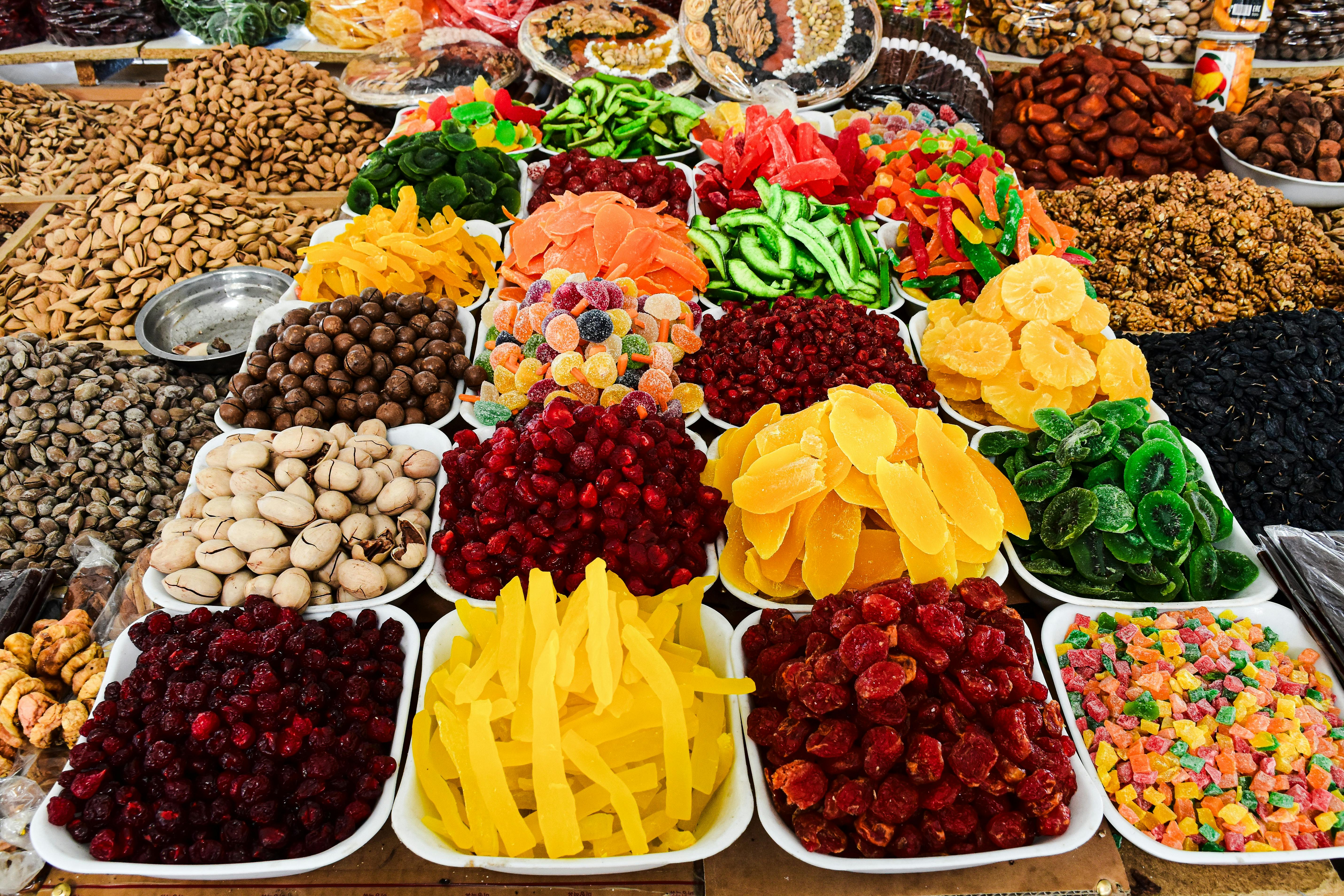 A display of different types of dried fruit and nuts · Free Stock Photo
