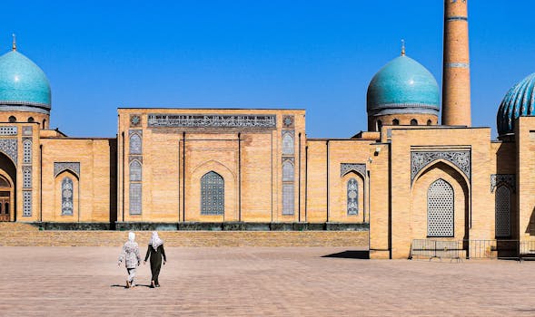 Beautiful mosque with turquoise domes in Tashkent, showcasing Islamic architecture.