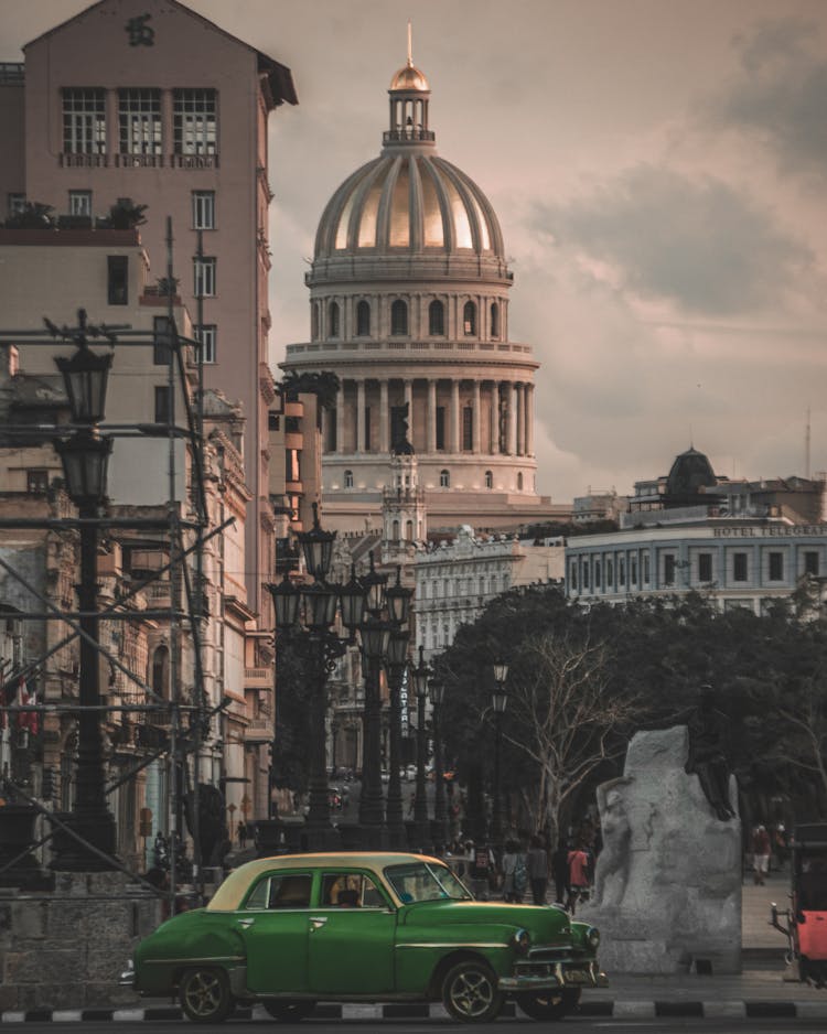 Green Retro Car On City Street