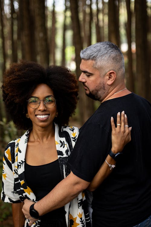 Happy Woman and Man Standing Together