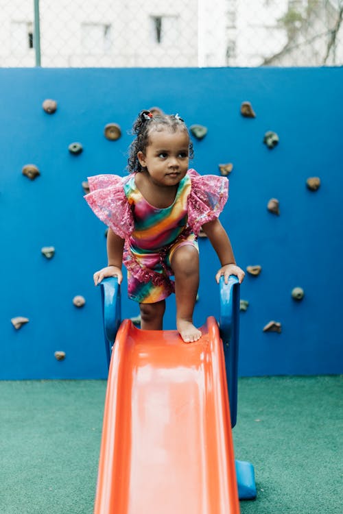 Free Little Girl on Slide Stock Photo