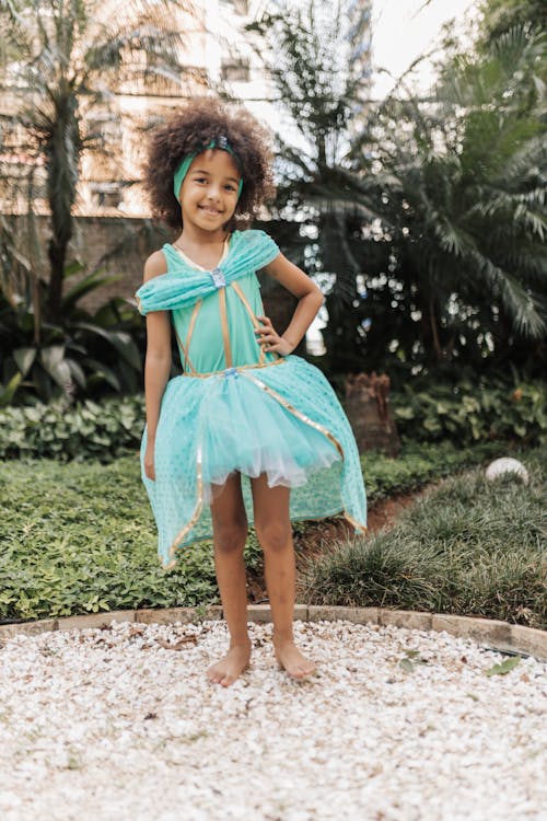 Smiling Girl in Green Dress