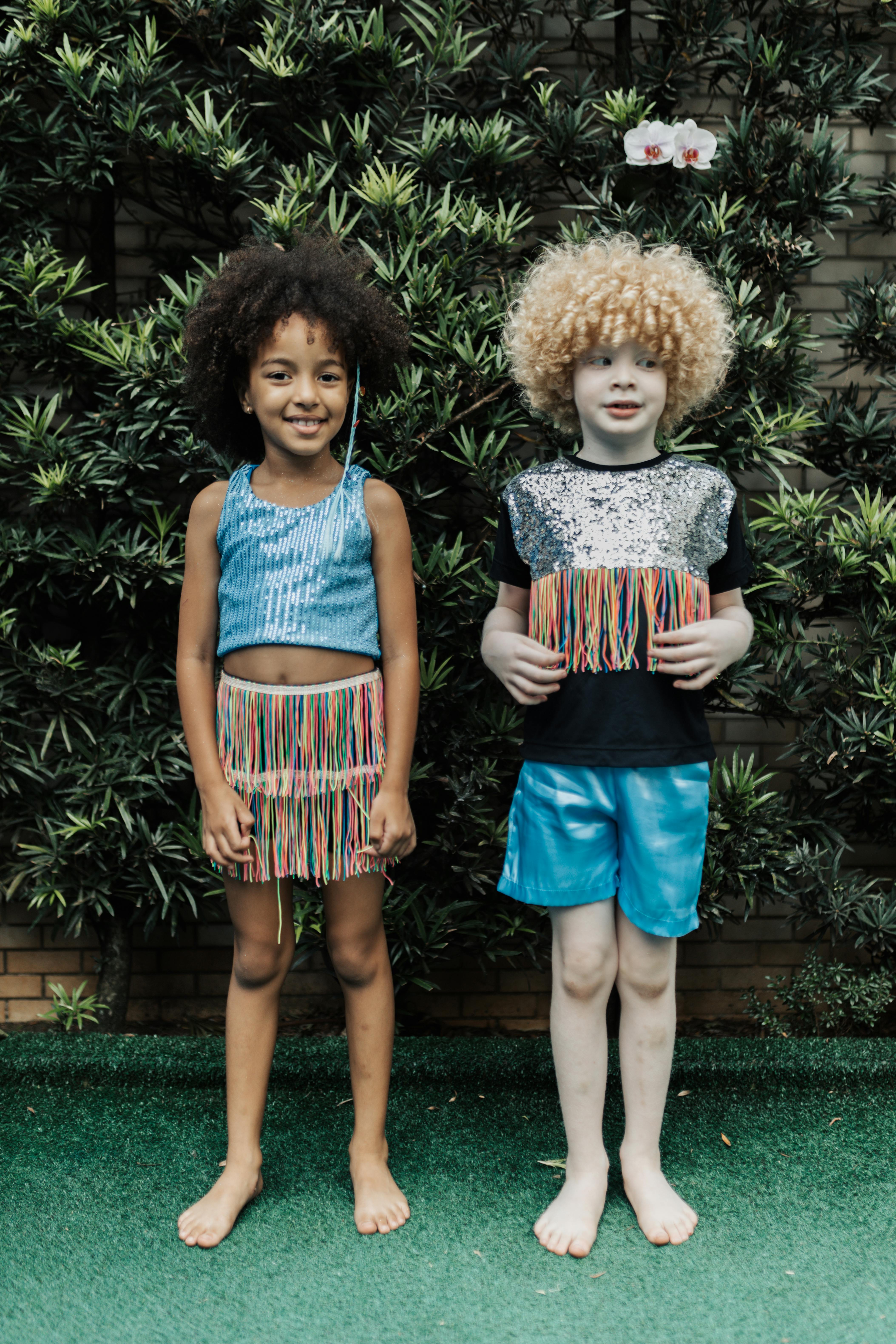 Two Girls in Matching Clothes · Free Stock Photo