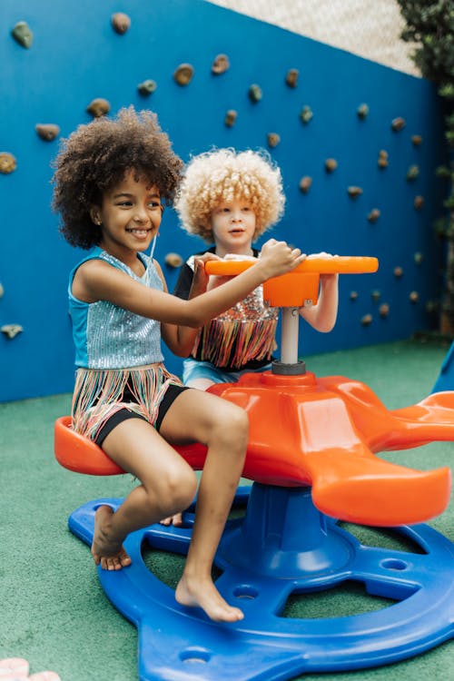 Free Children Having Fun on a Playground  Stock Photo