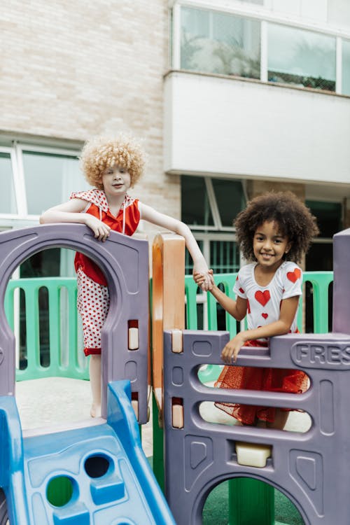 Free Children Having Fun on a Playground  Stock Photo