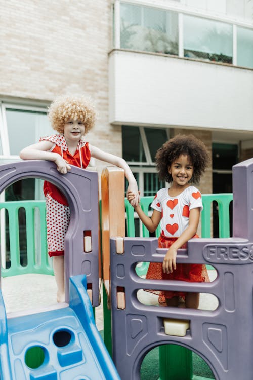 Free Children Having Fun on a Playground  Stock Photo