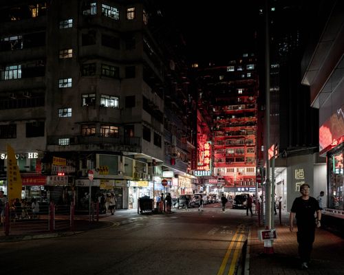Free Explore the bustling nightlife and illuminated streets of Hong Kong's urban districts. Stock Photo
