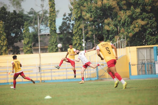 Action-packed soccer game at Jakarta stadium with players in motion captured in a lively setting.