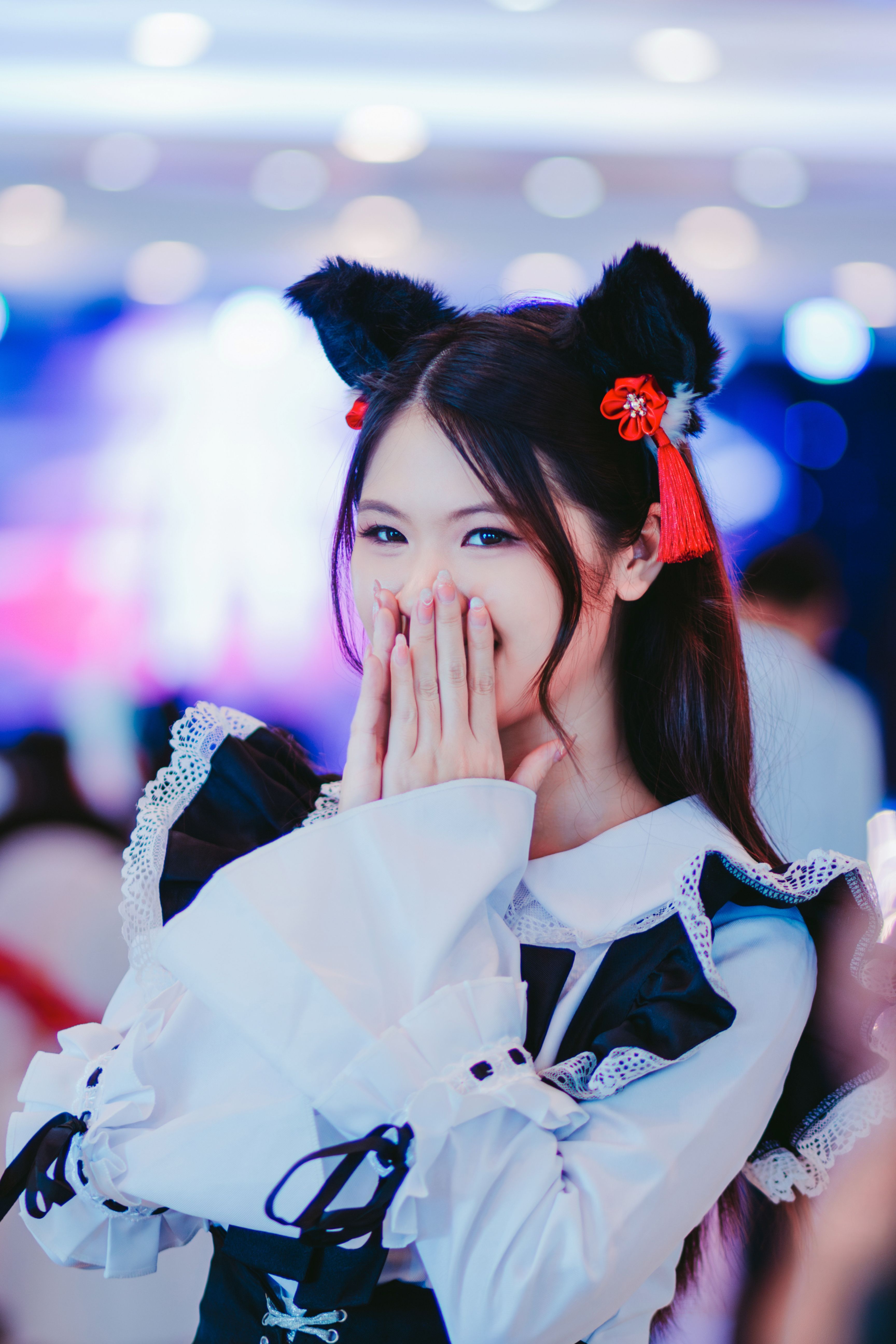 Woman in Cosplay Costume of Anime Hero Smiling into Hands · Free Stock ...