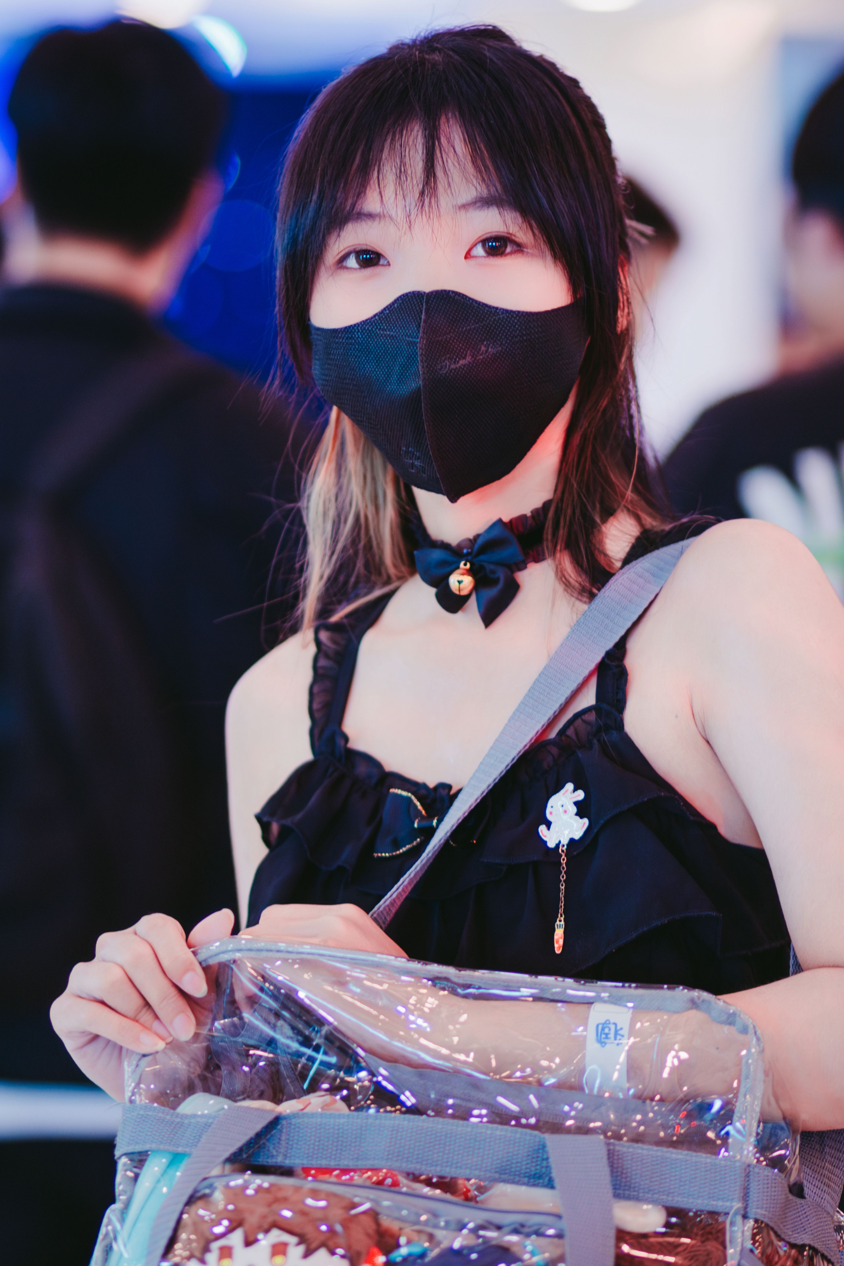 Brunette Woman in Black Mask