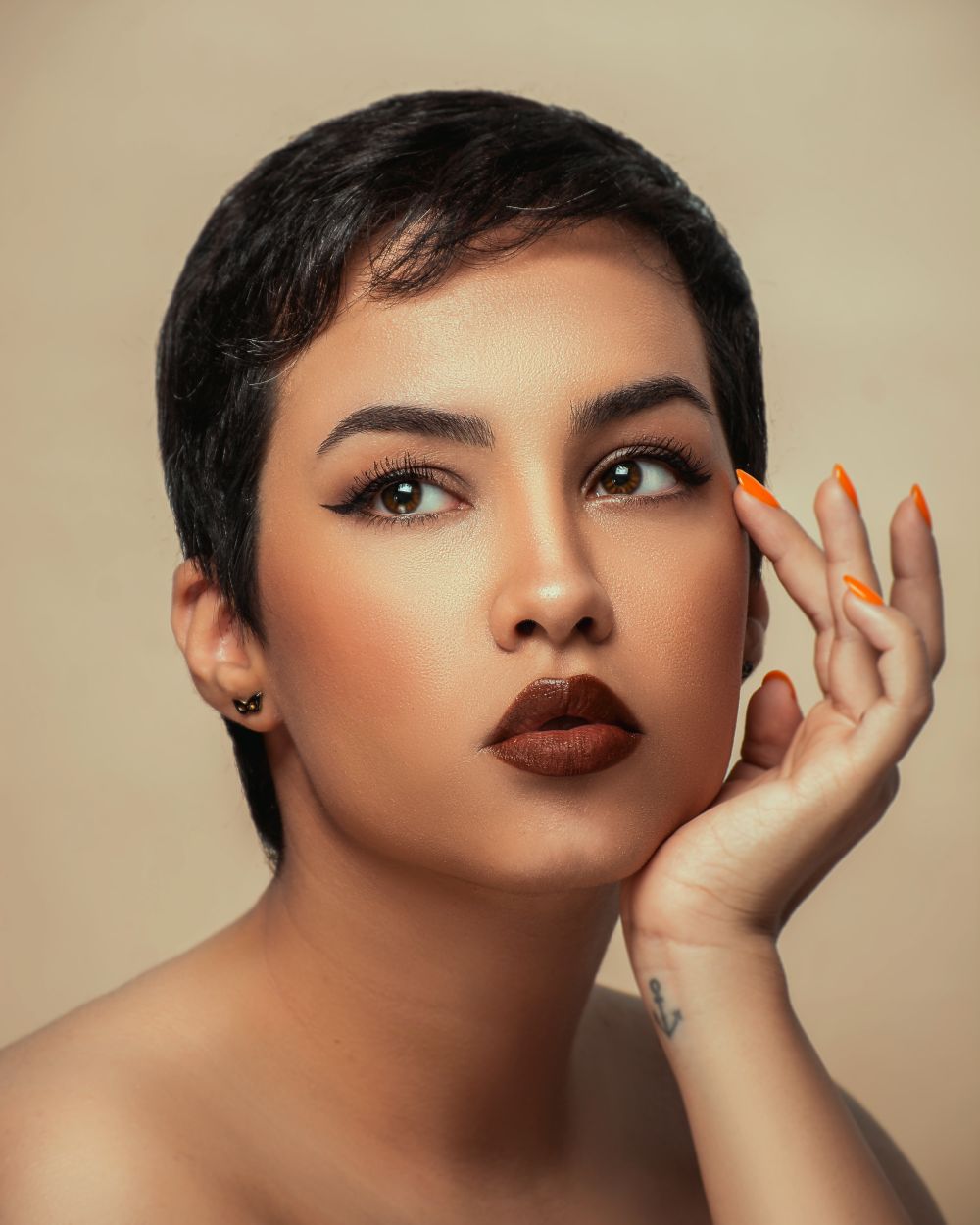 Studio portrait of a model with bold makeup — photo by Pegah Sharifi on Pexels