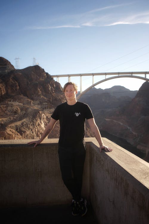 Tourist at the Hoover Dam with the Mike OCallaghan–Pat Tillman Memorial Bridge in the Background