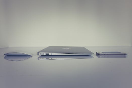 Silver Magic Mouse Beside Macbook
