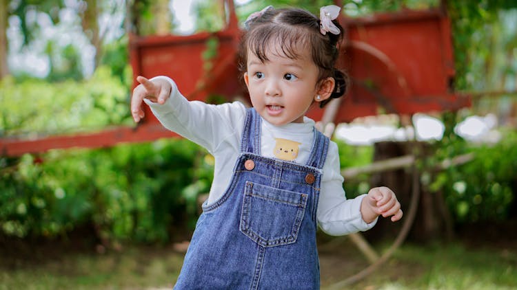 A Little Girl Playing Outside 