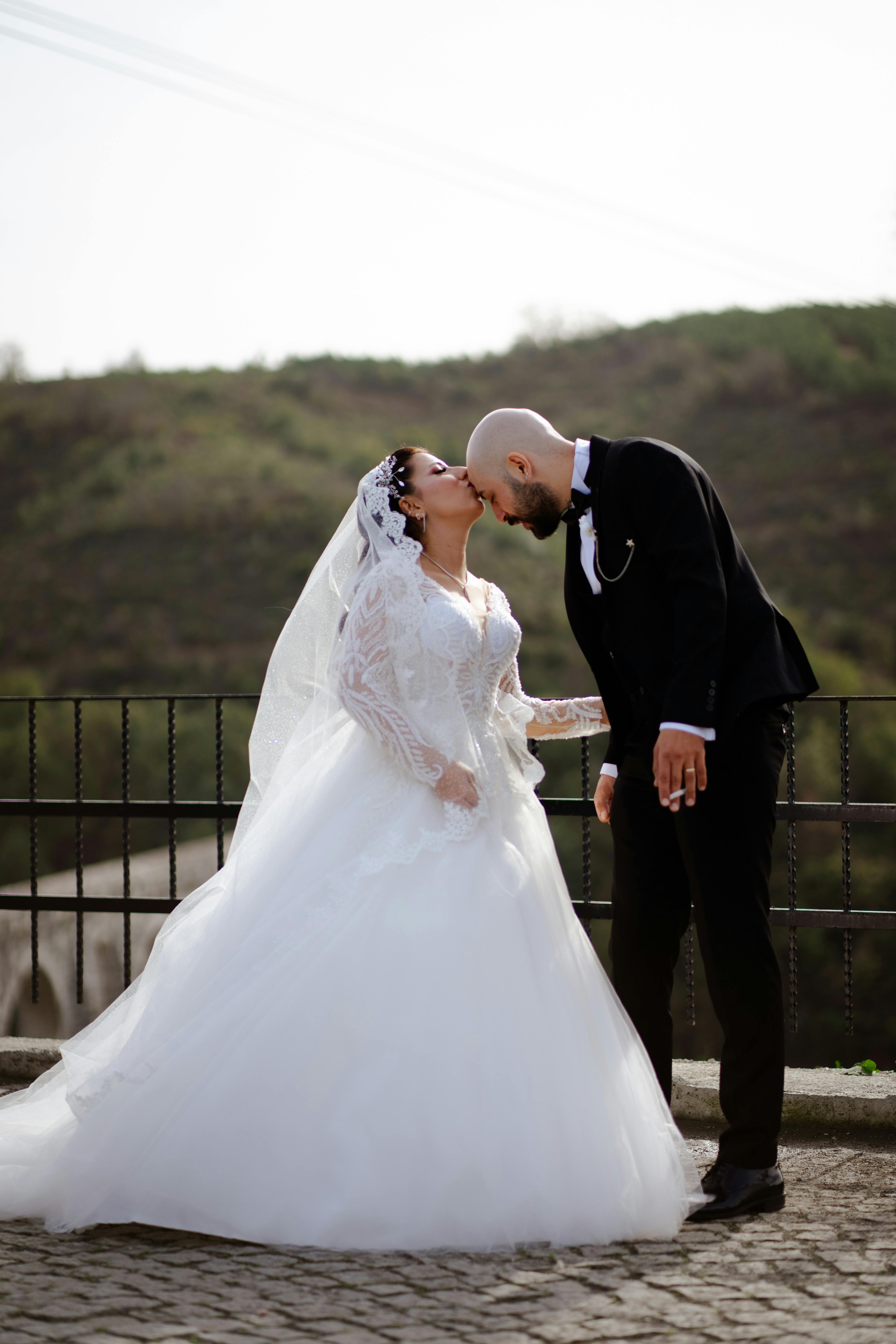 woman kissing husband