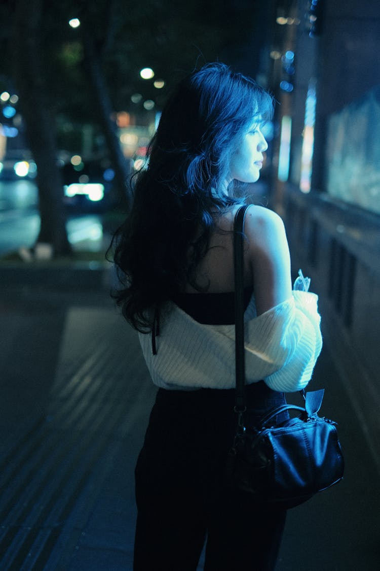 Attractive Slim Brunette In City At Night