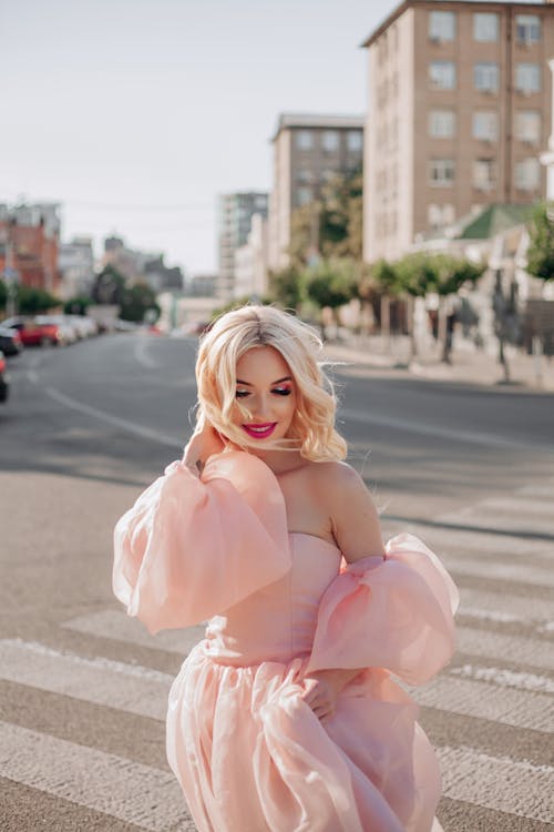 Woman in Pink Dress on Crosswalk