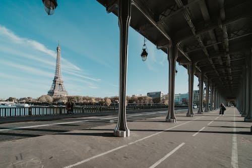 Pavement on Bridge and Eiffel Tower behind in Paris