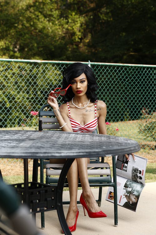 Skinny Woman Sitting in the Park