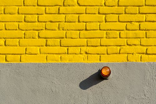 Close up of Sunlit Wall with Yellow Bricks