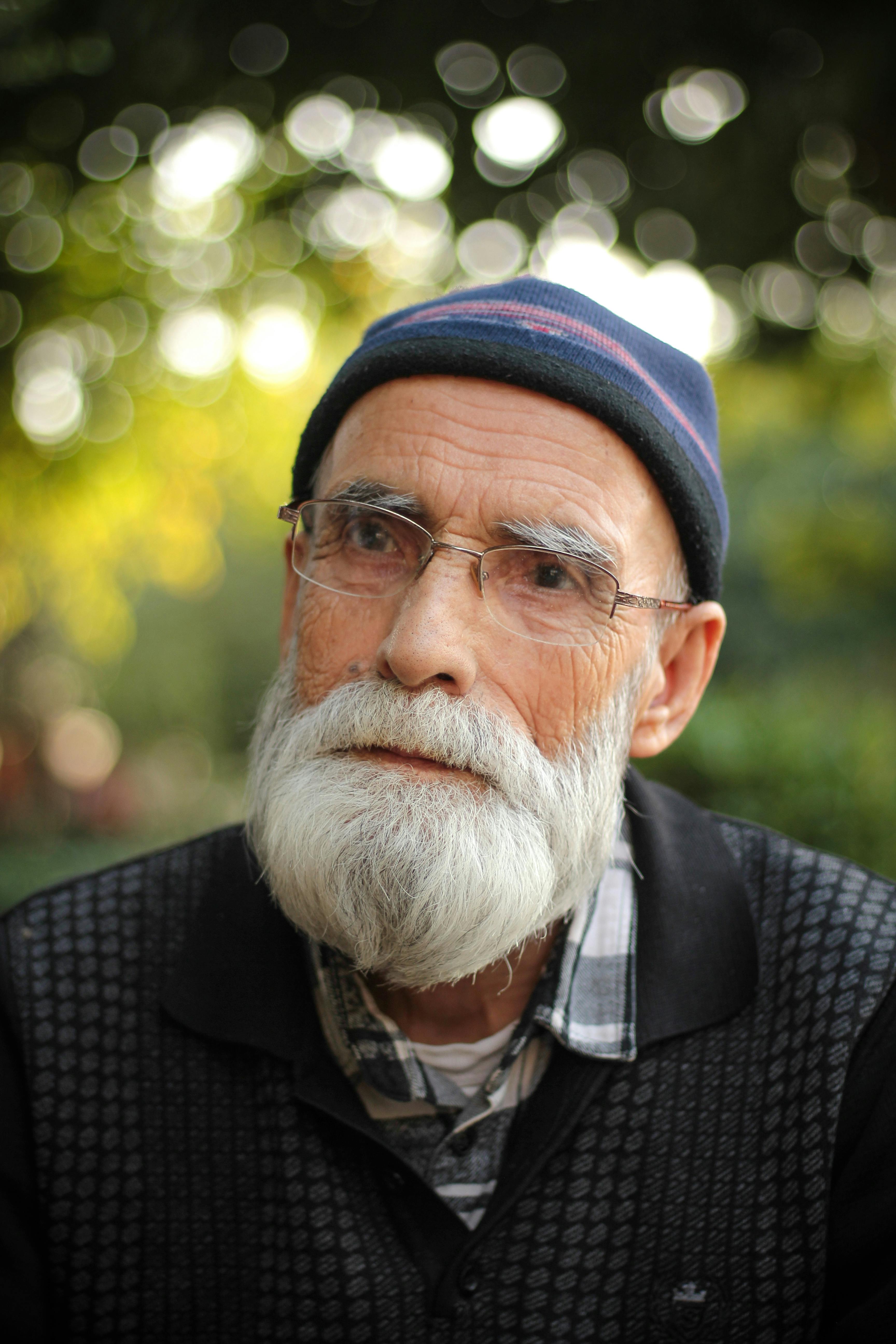 Older Man with Beard and Hat Stock Image - Image of white, shirt: 106234387