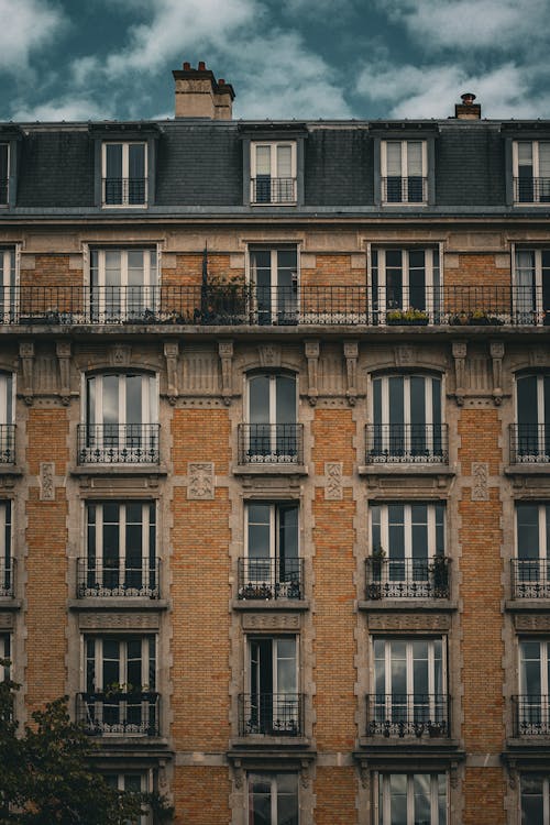 Residential House with many Balconies and Windows