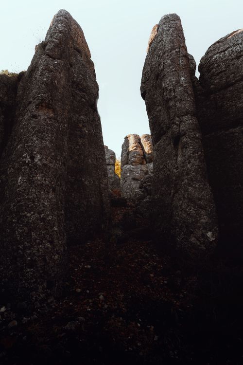 Free Explore towering rock formations and dramatic cliffs in this stunning natural landscape. Stock Photo