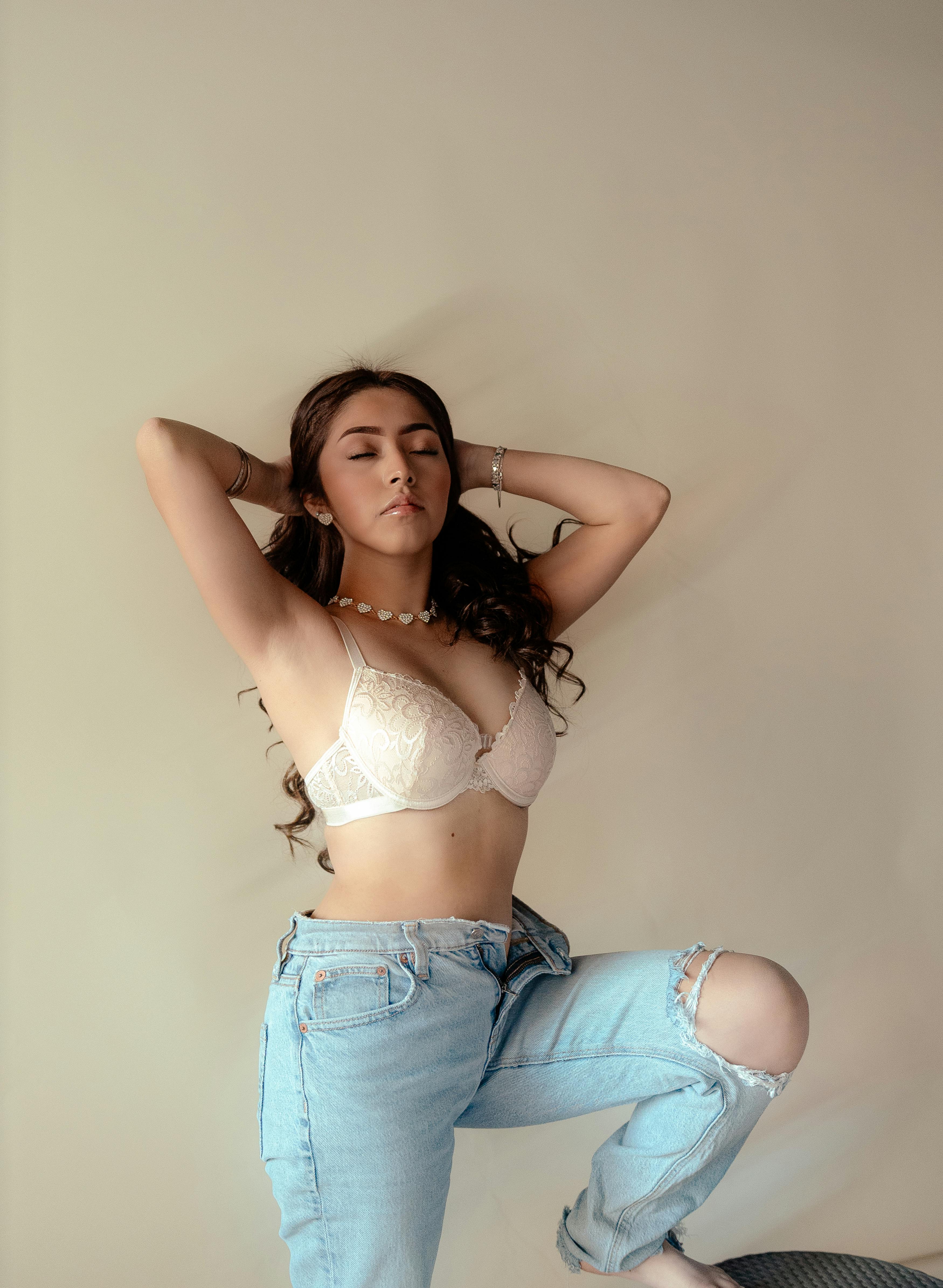 Attractive Girl In White Bra And Jeans Free Stock Photo and Image