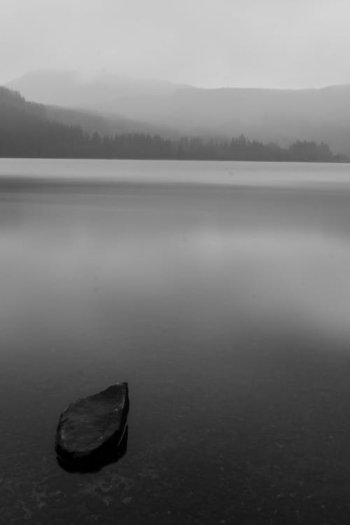 Lake in a Mountain Valley in Mist in Black and White