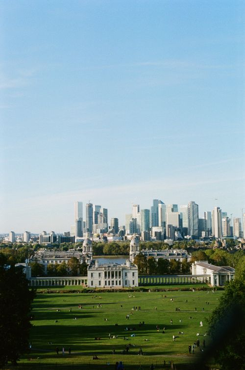 Free Aerial view of Greenwich Park in London with the city skyline in the background. Stock Photo