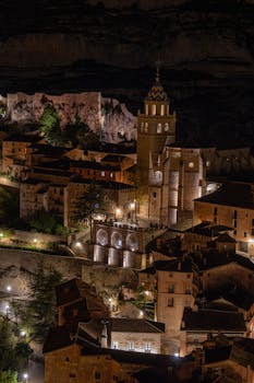 A captivating aerial night view of Teruel's historic architecture, Spain.
