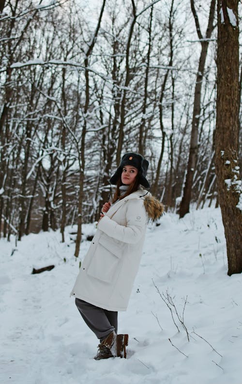 Woman in a Forest in Winter