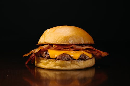 Close-up of a Burger with Cheese and Bacon