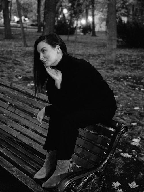 Woman Sitting on Bench