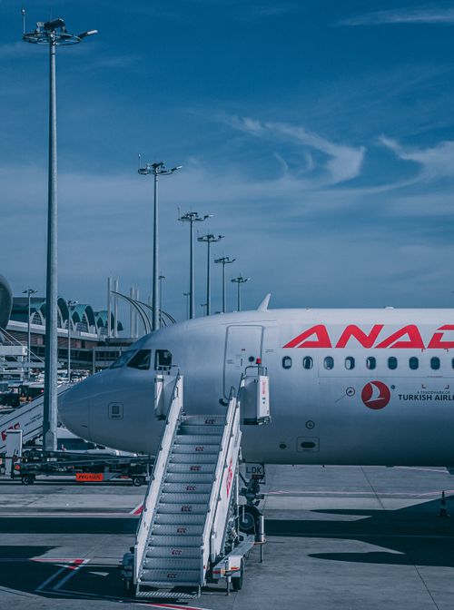Free Turkish Airlines aircraft at Istanbul Airport, with clear weather and runway facilities. Stock Photo