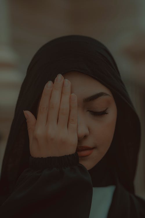 Portrait of a Woman Wearing a Headscarf 