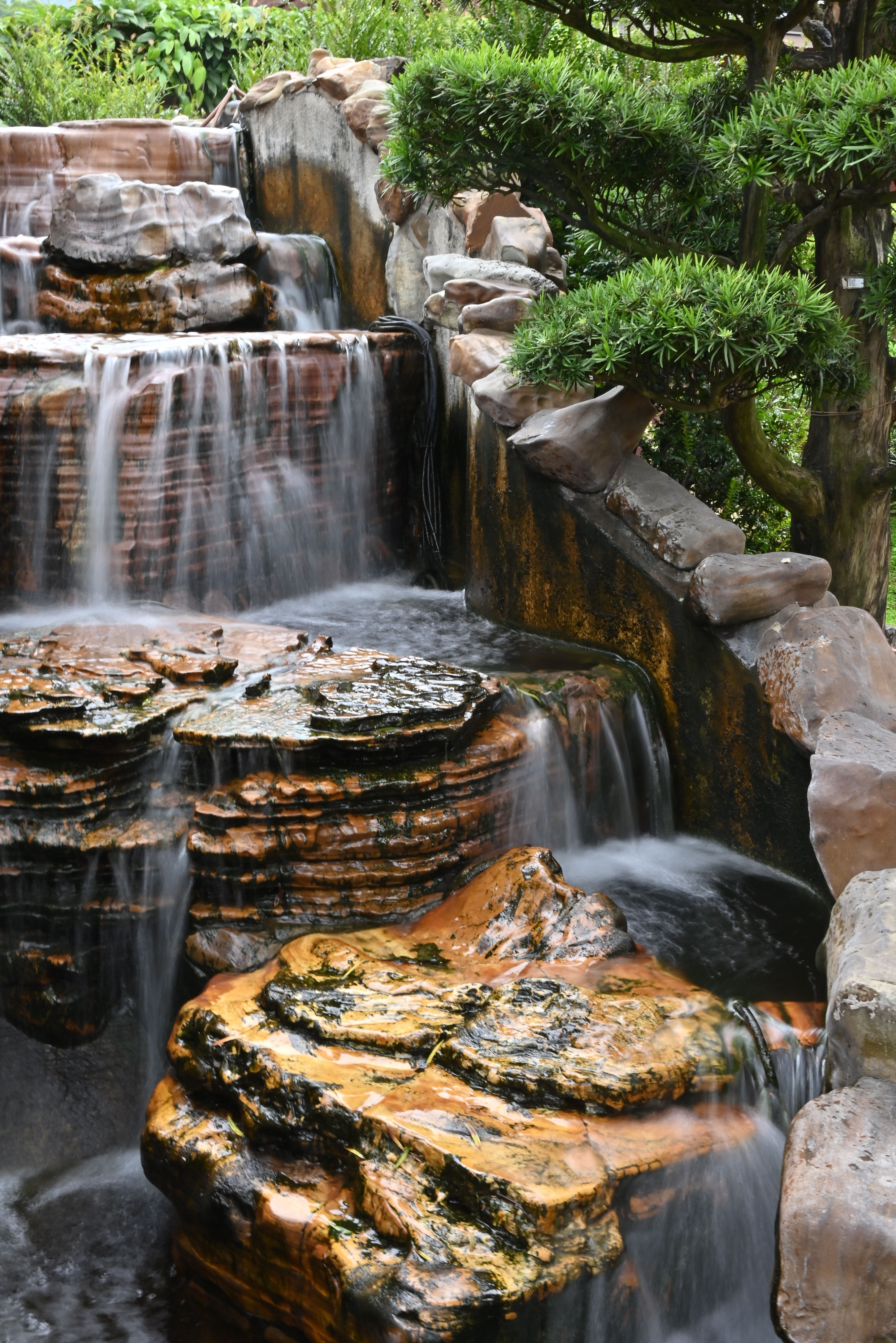 Landscape with Waterfall Flowing on Rocks · Free Stock Photo