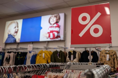 Discount Sign in Clothes Store